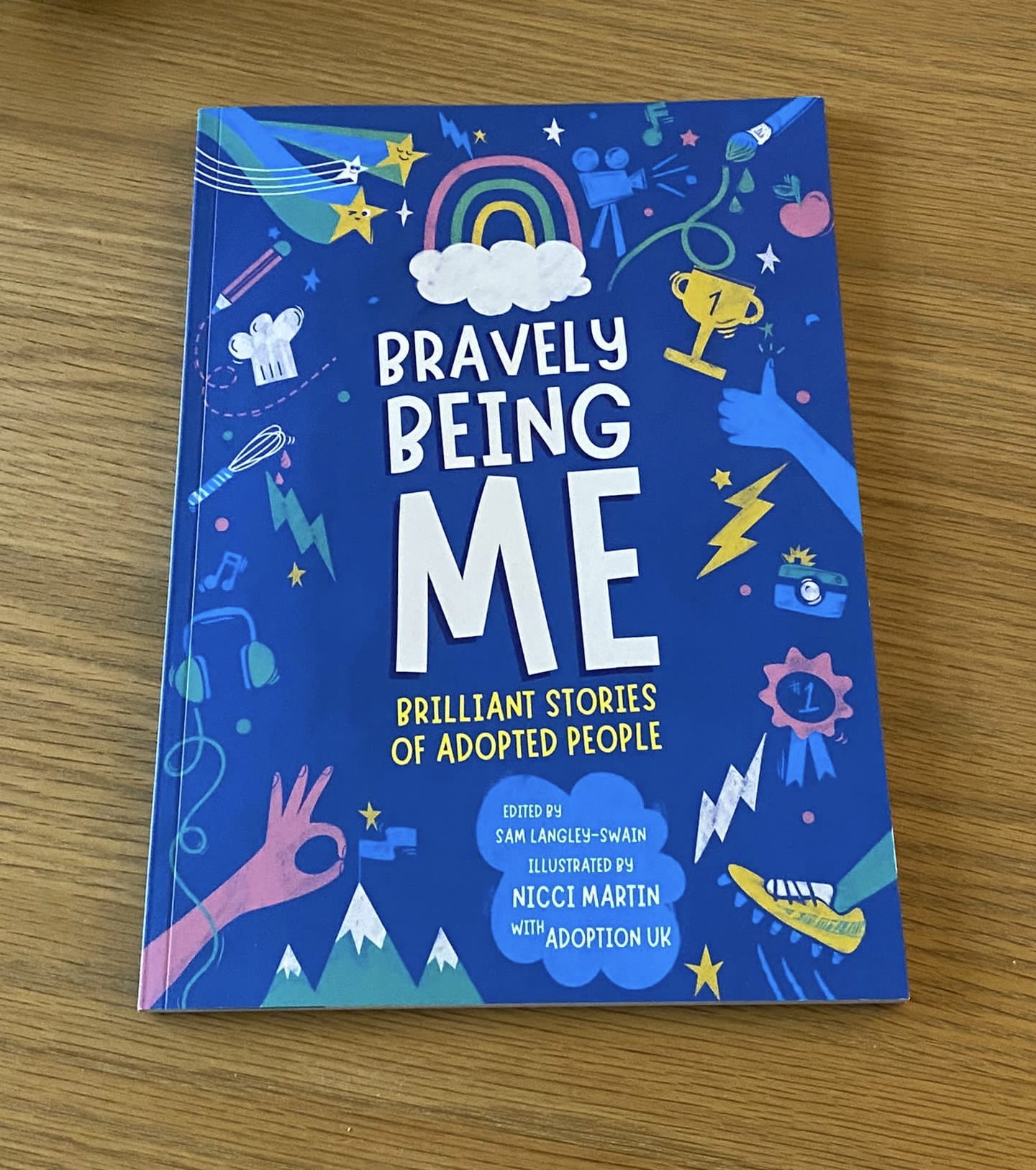 The book Bravely Being Me: Brilliant Stories of Adopted People, edited by Sam Langley-Swain with Adoption UK